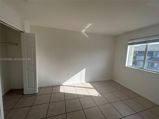 Building Photo - 5655 NW 109th Ave