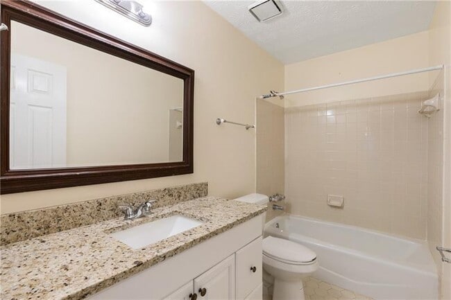 Building Photo - 5000 Village Green Way