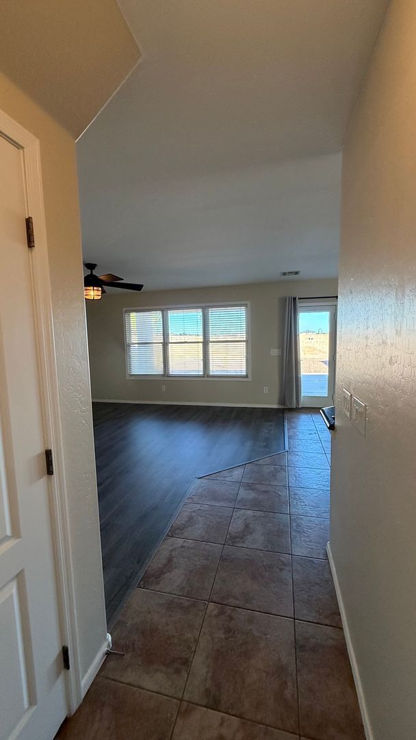 Building Photo - Spacious Surprise home with large backyard