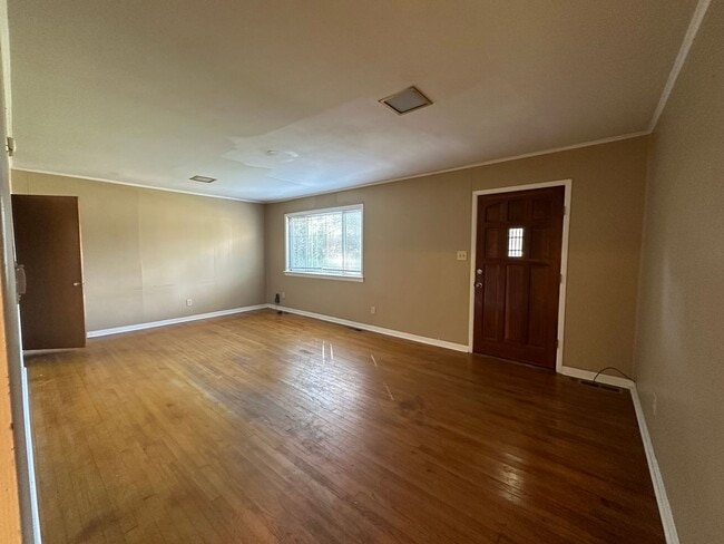 Building Photo - Welcome to this conveniently located 2-bed...