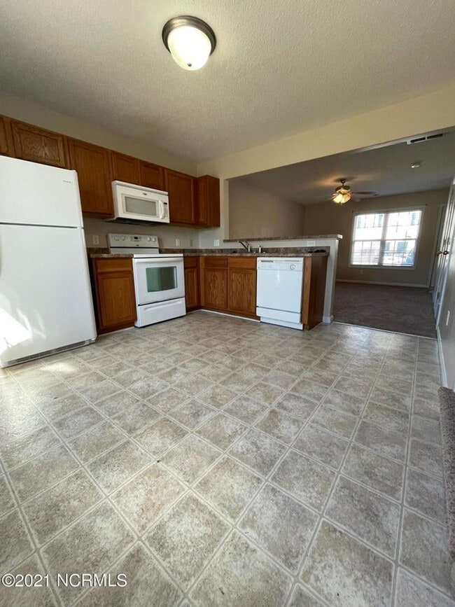 Building Photo - Welcome to Cornerstone Village!