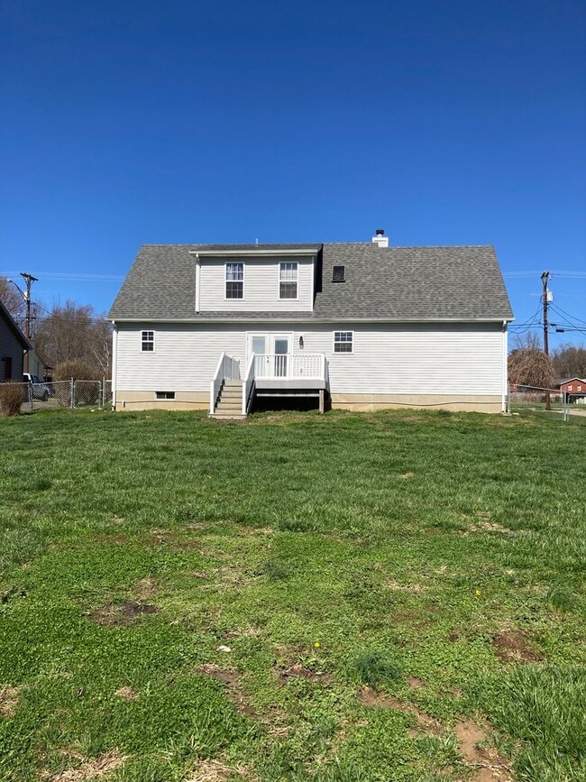 Building Photo - **Backyard offers County Setting in City L...