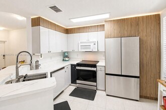 Building Photo - Northeast 8th Avenue, Miami Shores, FL 33138 - 2 BR 2 BA townhouse
