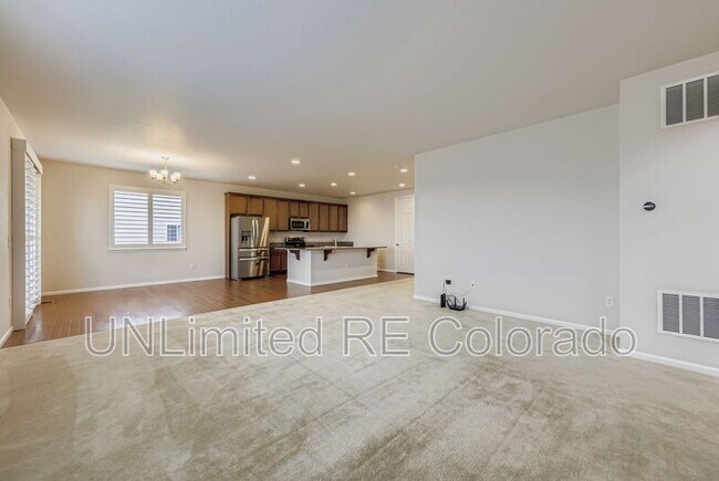 Building Photo - 6782 Petunia Pl
