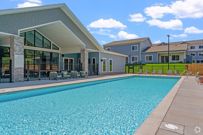 Relax by the pool at The Lodge Luxury Apartments in Rochester MN