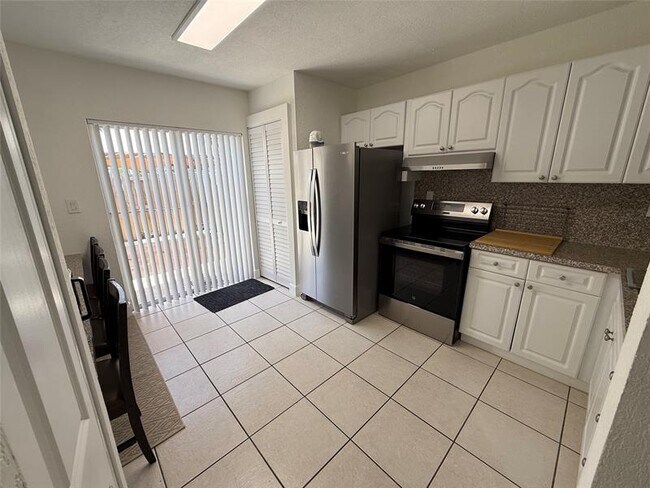 Building Photo - 7015 NW 173rd Dr