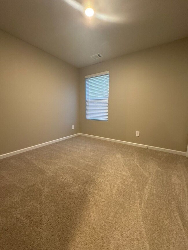 Building Photo - 4 Bedroom, 2.5 Bath and 2 Car Garage in Hartmann Crossing! $500 OFF FIRST MONTH’S RENT!