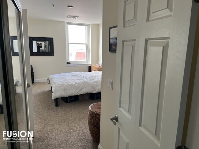 Building Photo - STUNNING LAKE VIEWS - Modern 2BR/2BA Corner Unit in The Vermont House