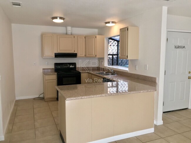 Building Photo - 7409 Village Green Dr