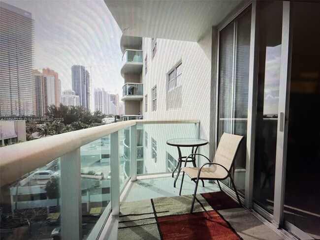 Building Photo - 19370 Collins Ave