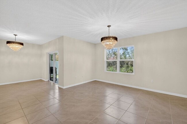 Building Photo - Available Now in Tavares | 2023 Built 4BR/2BA Home with 2-Car Garage