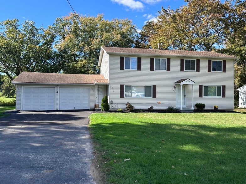 Unit is the left side of house, both upper and lower - 2311 Baird Rd