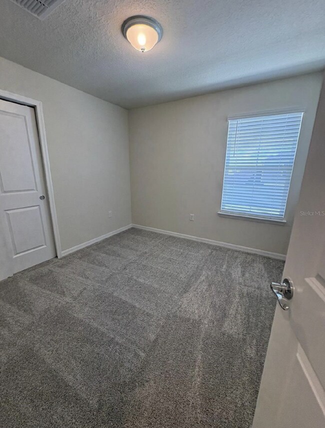 Building Photo - Live Large in Winter Garden: Modern 4-Bedroom Townhouse Haven