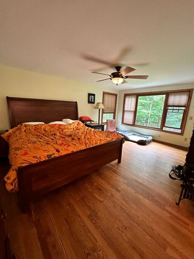 Building Photo - Dream Home in Highland, Michigan: Your Private Oasis on 5 Wooded Acres