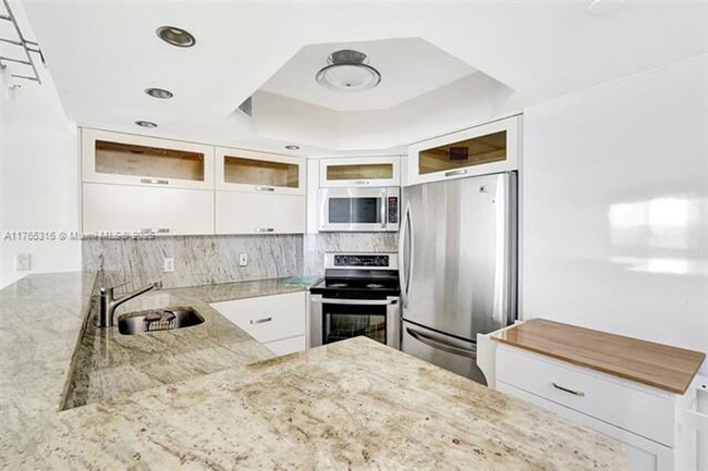 Building Photo - 8911 Collins Ave