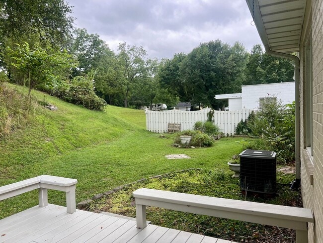 Building Photo - One Level Home! 3or 4 bedroom 1 bath with extra-large den, garage and extra storage on almost an ...