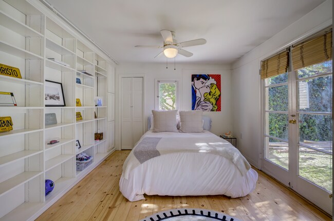 Bedroom 1 with built-in bookshelves - 3626 Veteran Ave