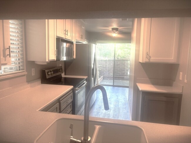 Building Photo - Beautiful 3-Bedroom Condo with Private Out...