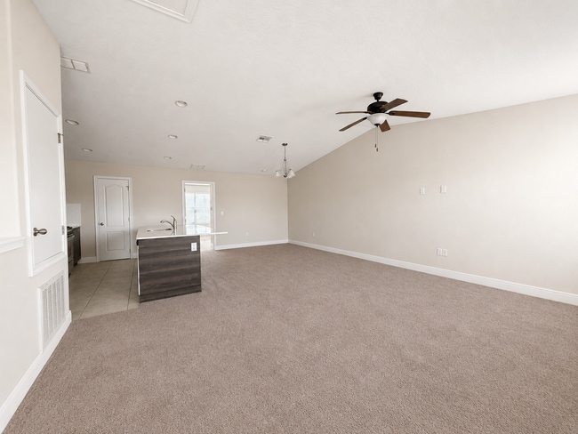 Building Photo - Charming 2-Bed Townhouse with Granite Elegance in Haines City – Spacious 1,464 Sq. Ft. Retreat!