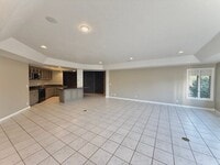 Building Photo - Garden Level in Luxury Home Available Now