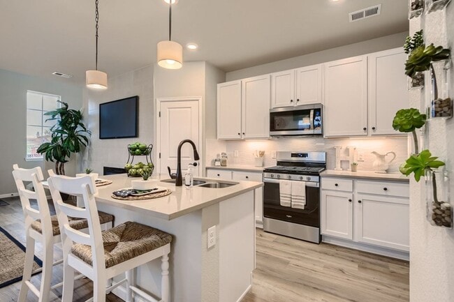Building Photo - Embrace urban living in Highlands Ranch, CO with a new home at Verona.