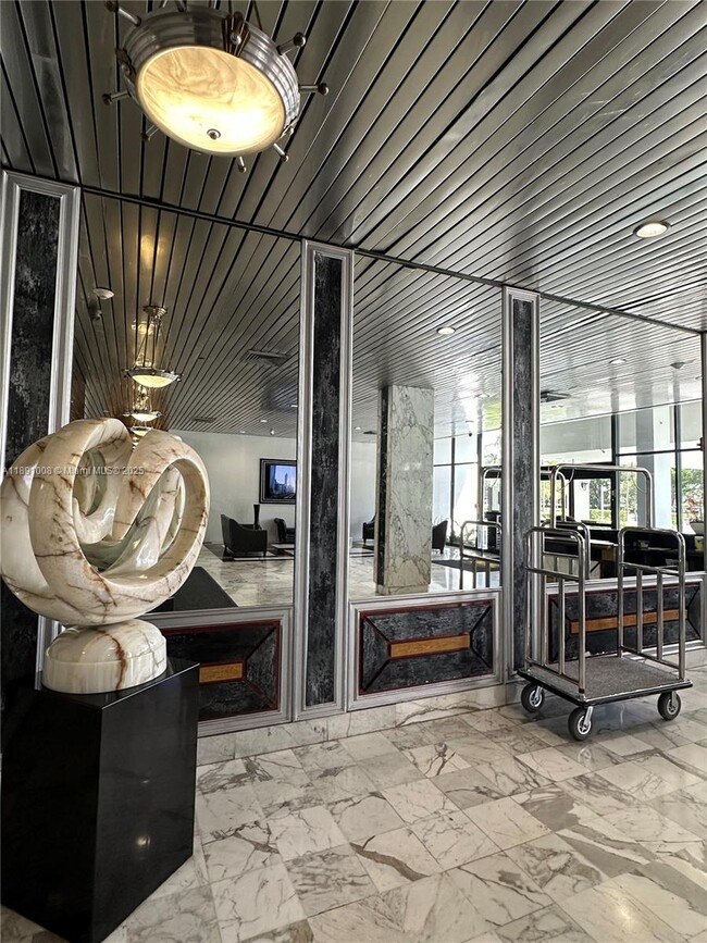 Building Photo - 3675 N Country Club Dr