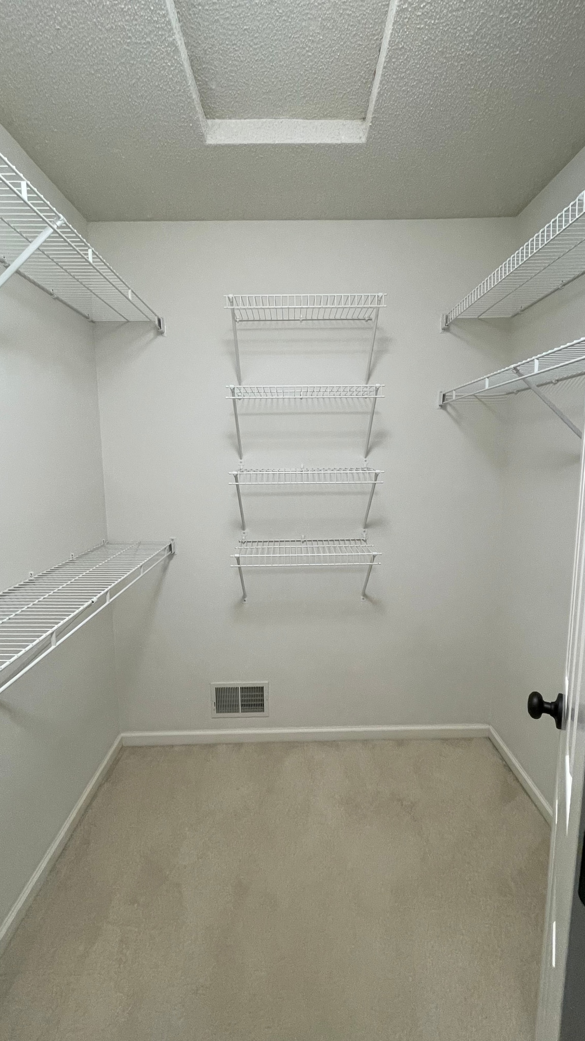 Master bedroom walk-in closet. - 15805 24th Ave N.