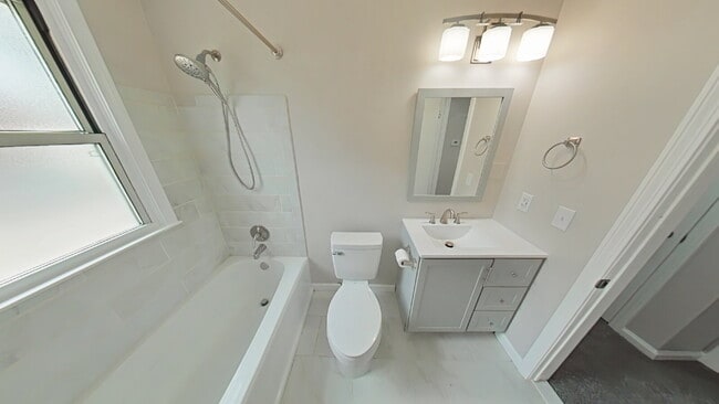 Building Photo - " 2-Bed Home with Gleaming Hardwood Floors...