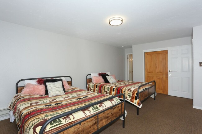 Building Photo - Walk to everything! Partially Furnished! Flexible lease terms!