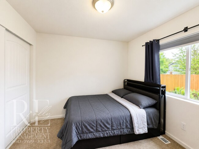 Building Photo - Spacious 3-Story Home with Flexible Living Space, Heat Pump & Private Deck Retreat