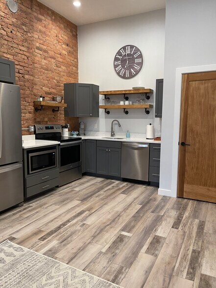 Kitchen with laundry room door - 106 W Michigan Ave