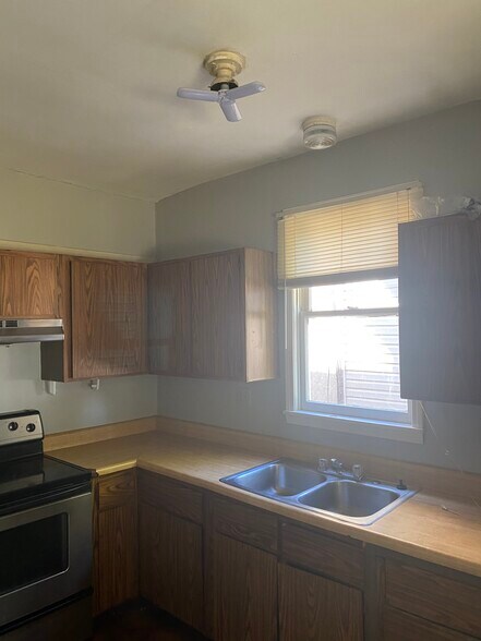 Kitchen sink with cabinets - 362 E Markison Ave
