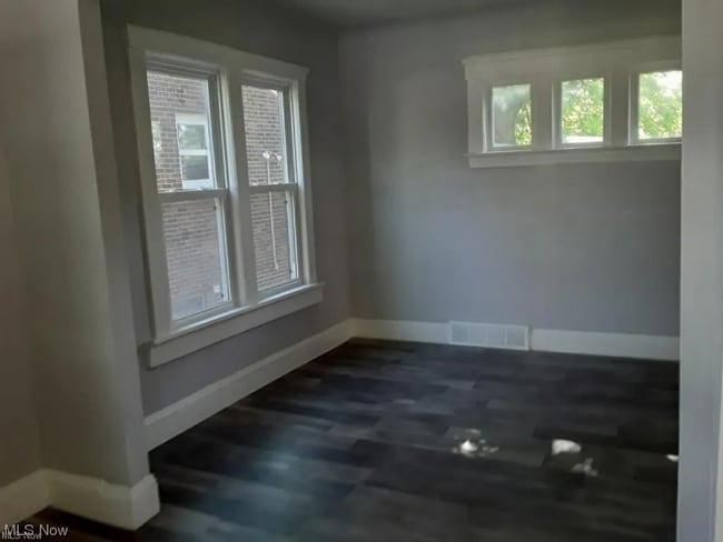 Building Photo - Charming Cape Cod Home with Character and Potential