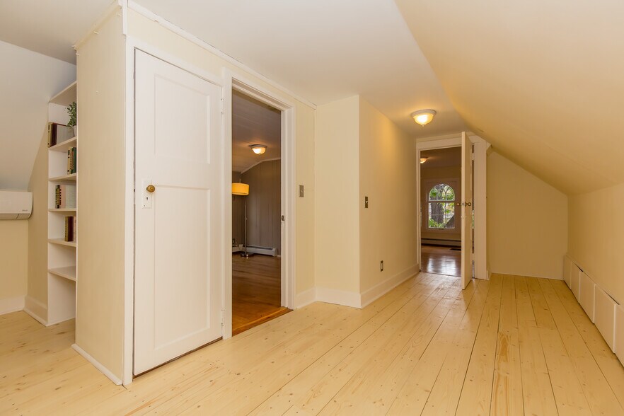 Upper floor of apartment features brand new cedar floors - 715 5th St SE