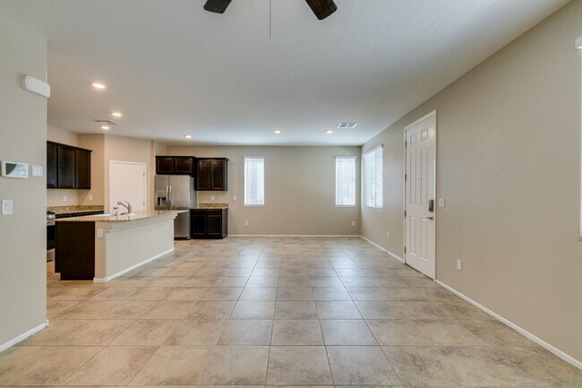 Building Photo - Spacious Townhouse with Loft & Rare 3-Car Garage!