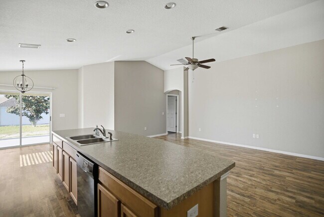 Building Photo - 4BR Gated Community Home with Fenced Yard, 2-Car Garage & Open Floor Plan