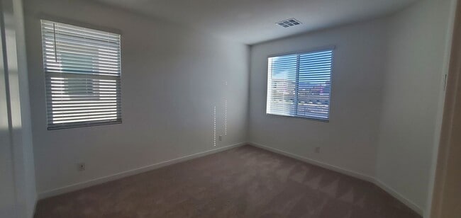 Building Photo - Beautifully designed modern townhome with attached garage.