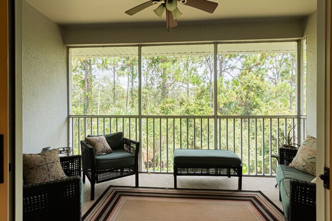 Building Photo - Peaceful Preserve-View Condo in Gated Blue Heron