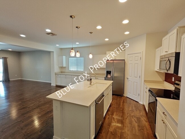 Building Photo - 34185 S Presidio Pl