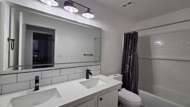 Building Photo - Beautifully remodeled pool home situated on a spacious quarter-acre lot