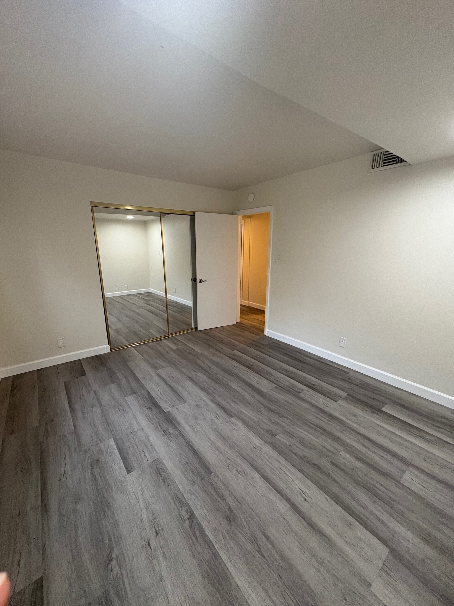 From opposite corner and looking back toward the doorway, the master mirrored closet is on the left - 23162 Smith Rd