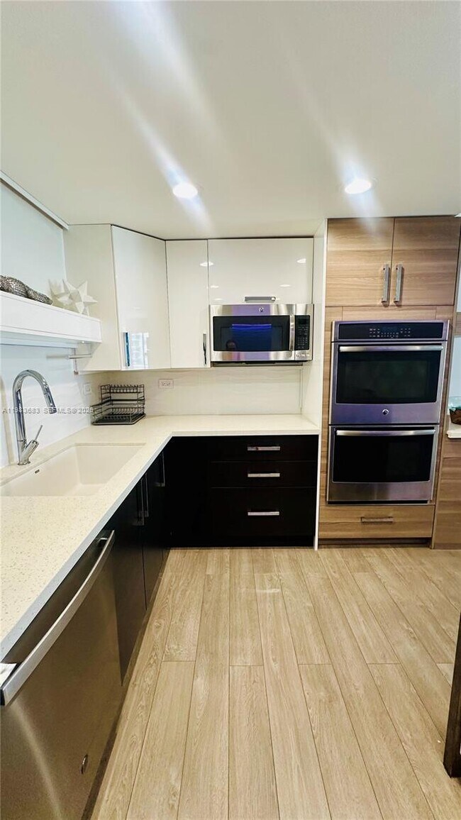 Building Photo - 19390 Collins Ave