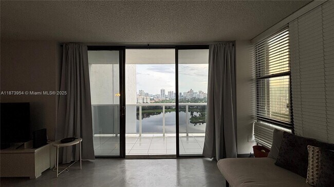 Building Photo - 3675 N Country Club Dr