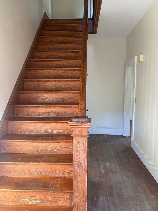 stairs to 2nd floor - "old growth" wood - 183 Main St