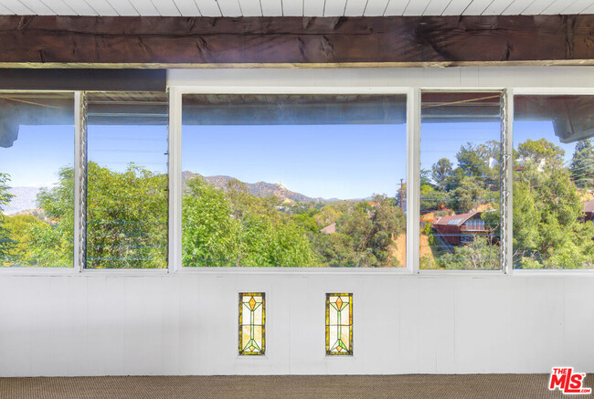 Building Photo - 7149 Woodrow Wilson Dr