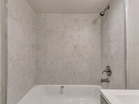 Building Photo - Newly renovated efficancy with fenced yard.