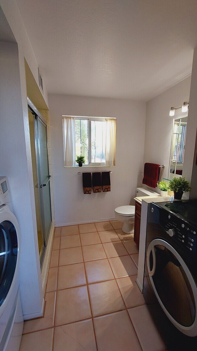 Laundry room, full bath - 5161 E Camino Bosque