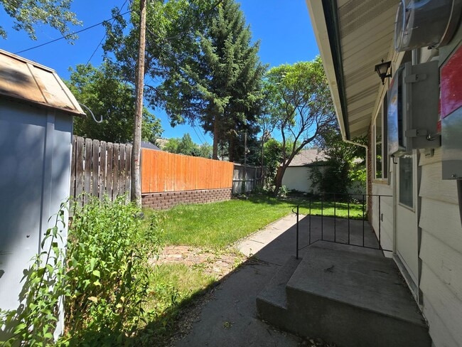 Building Photo - Spacious 4 Bedroom Home with Solar Panels, Fully Fenced Yard on Rimrock Rd