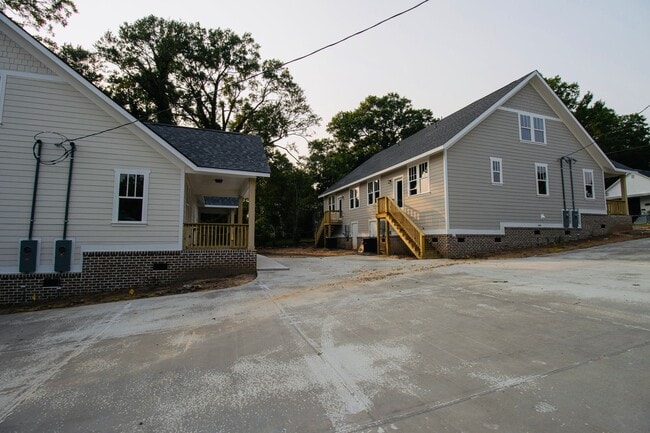 Building Photo - Pick Your Neighbors! Brand-New 3 Bed, 3 Ba...