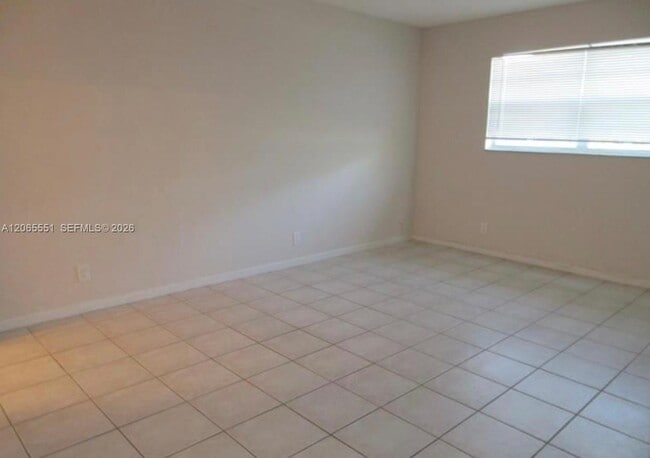 Building Photo - 10751 Royal Palm Blvd